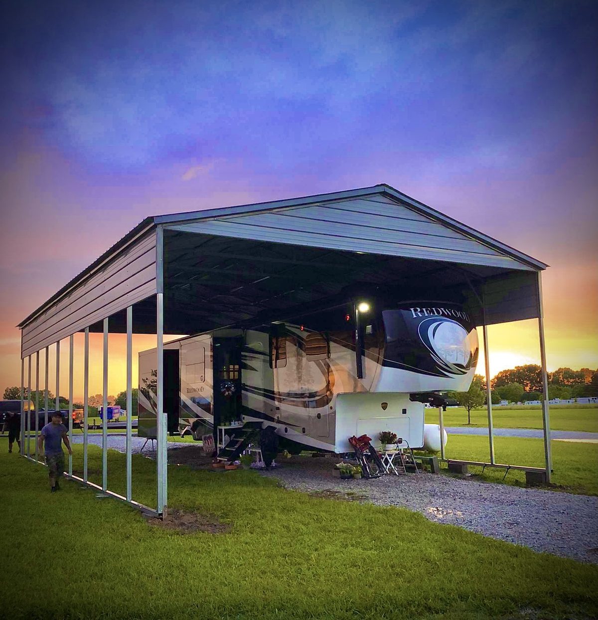Legacy metal RV cover sheltering a camper